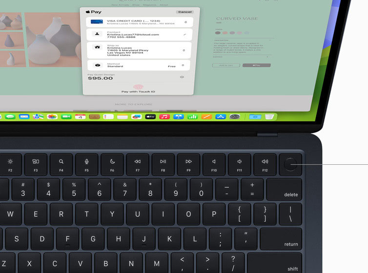 Top view of MacBook Air showcasing Touch ID and Magic Keyboard working with Apple Pay.