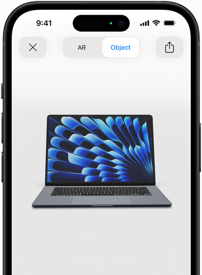 Preview of MacBook Air in Midnight colour being viewed in AR experience on iPhone