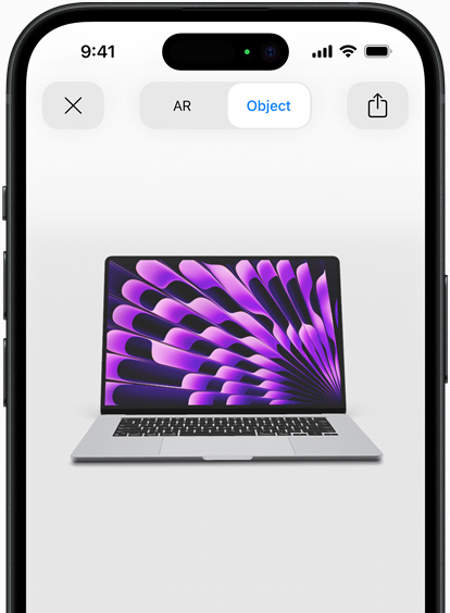 Preview of MacBook Air in Space Grey colour being viewed in AR experience on iPhone
