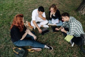 Gen Z college students sitting together