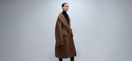 model wearing maxmara outerwear