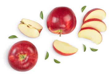 red apple with half isolated on white background with clipping path and full depth of field top view flat lay set or collection