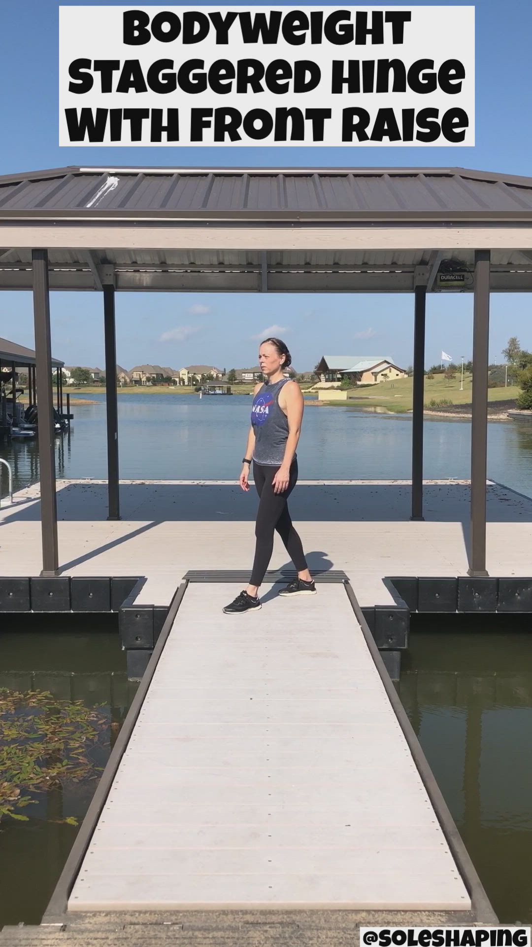 This may contain: a woman standing on top of a pier next to a body of water with text overlay