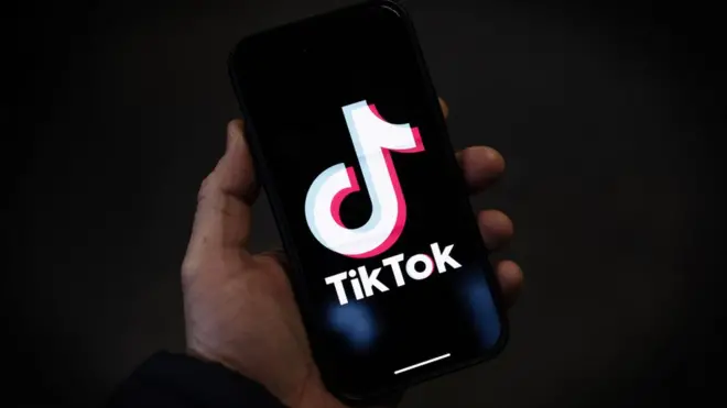 TikTok logo on smartphone screen