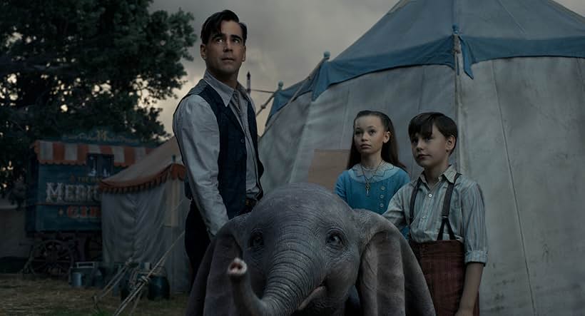 Colin Farrell, Finley Hobbins, and Nico Parker in Dumbo (2019)