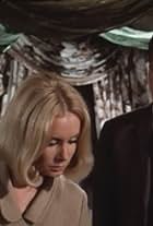 Roger Moore and Penelope Horner in The Saint (1962)