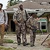 Tyler Hoechlin, Lance Reddick, and Kaden Washington Lewis in The Domestics (2018)