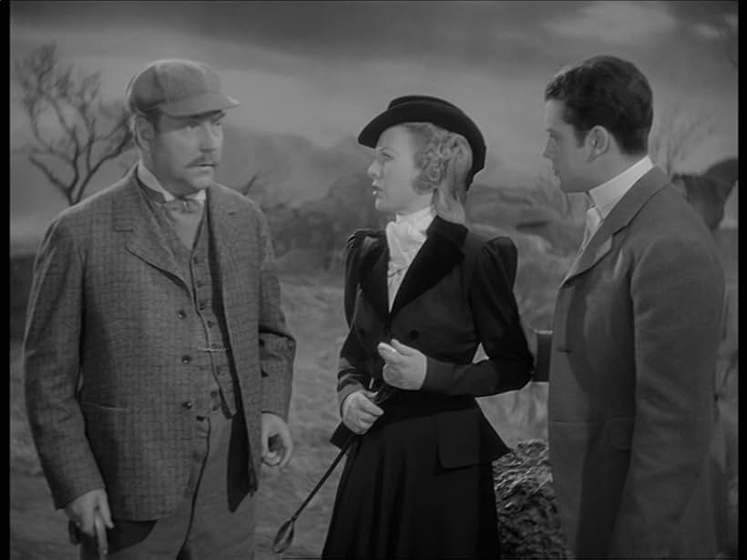 Wendy Barrie, Nigel Bruce, and Richard Greene in The Hound of the Baskervilles (1939)