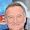 Robin Williams at an event for Happy Feet Two (2011)