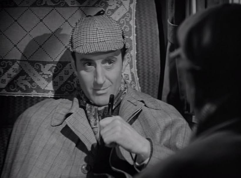 Basil Rathbone in The Hound of the Baskervilles (1939)