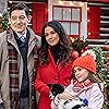 Emmanuelle Chriqui, Scott Ryan Yamamura, and Isabelle Franca in The Knight Before Christmas (2019)