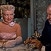 Betty Grable and Fred Clark in How to Marry a Millionaire (1953)