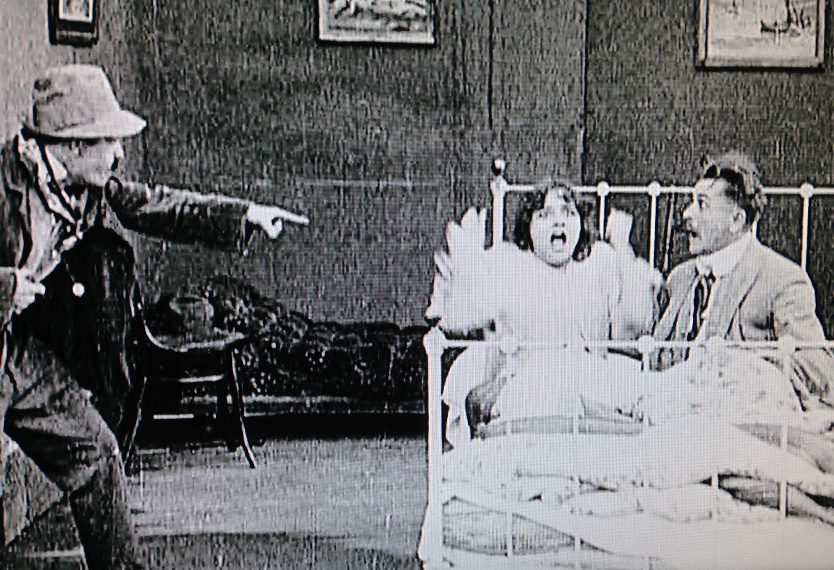 Billy Gilbert, Henry Lehrman, and Emma Clifton in Making a Living (1914)