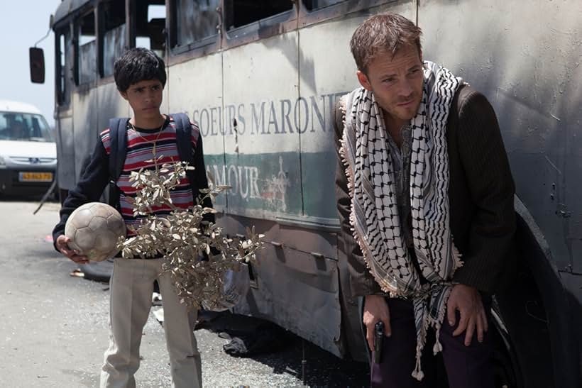 Stephen Dorff and Abdallah El Akal in Zaytoun (2012)