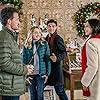 Catherine Bell, Mark Deklin, Luke Bilyk, and Sage Kitchen in Meet Me at Christmas (2020)