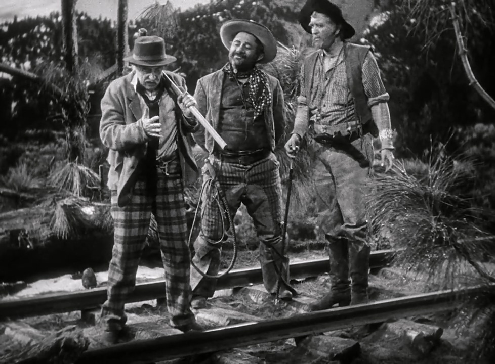 Henry Kolker, Lynne Overman, and Akim Tamiroff in Union Pacific (1939)