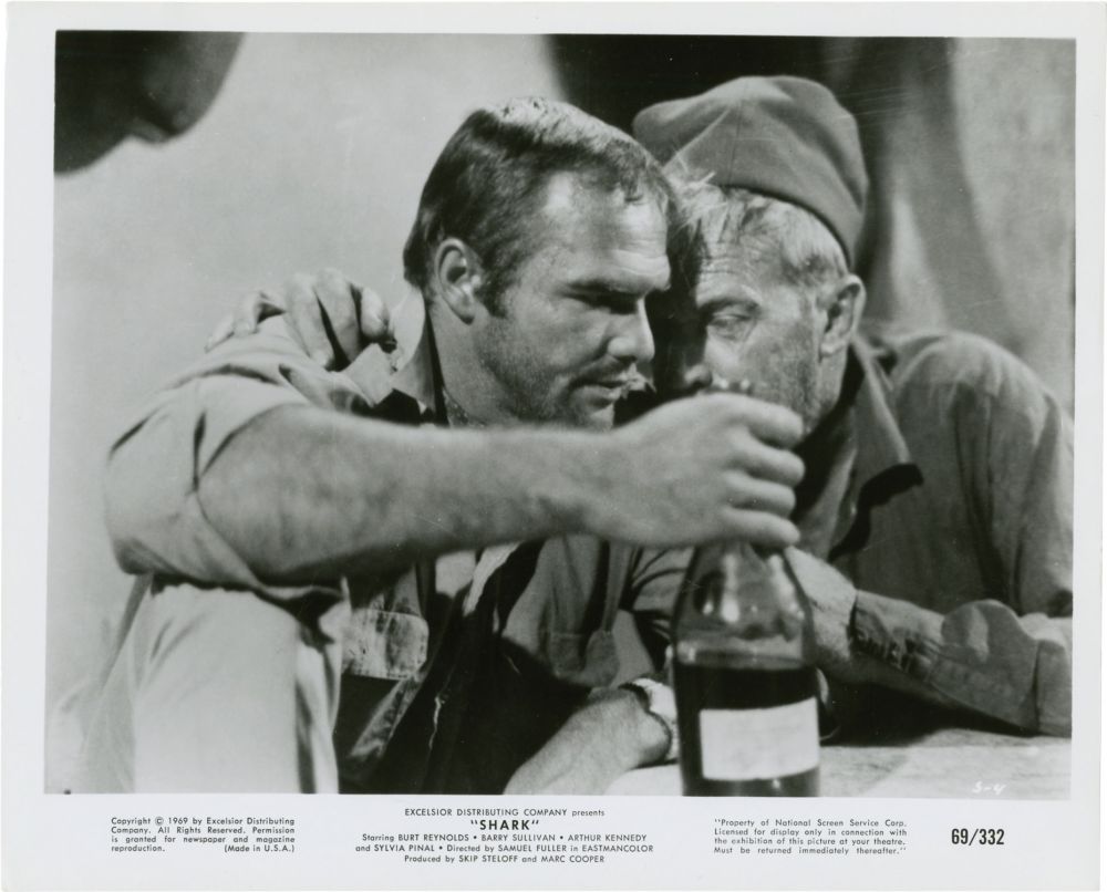 Burt Reynolds and Arthur Kennedy in Shark (1969)