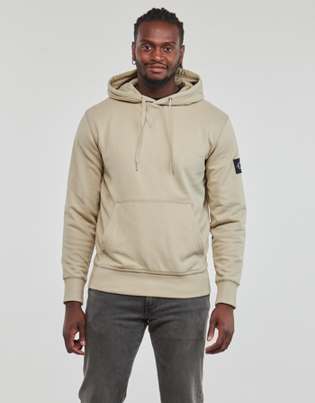 Odjeća Muškarci
 Sportske majice Calvin Klein Jeans BADGE HOODIE Bež