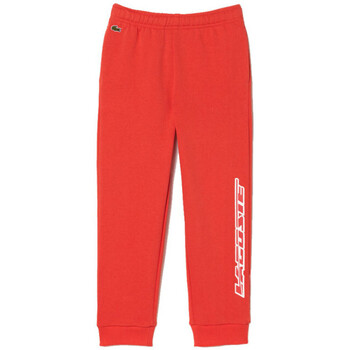 Vêtements Enfant Pantalons Lacoste PANTALON DE SURVÊTEMENT  ORANGE ENFANTS AVEC MARQUAGE Orange