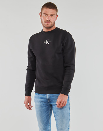 Ruhák Férfi Pulóverek Calvin Klein Jeans MONOLOGO CREW NECK Fekete 