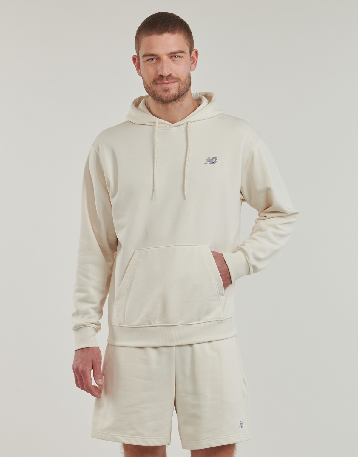 Ruhák Férfi Pulóverek New Balance BRUSHED SMALL LOGO HOODIE Bézs