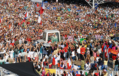 Pope Benedict XVI waving to a crowd outside the Basilica of Our Lady of Aparecida, state of São Paulo, Brazil.