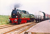 Stoomlocomotief 22 'Tom' van Hoogovens Stoom IJmuiden was in de jaren 80 en 90 een graag geziene gast tijdens de Bello Festivals. Hier te Medemblik, 1 augustus 1992. Foto: Rob Veninga.