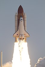 Columns of flames from shuttle