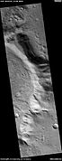 Layers and small craters, as seen by HiRISE under HiWish program. Layers are enlarged in next image.