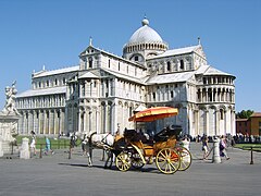 The Compound, with the Pisa Griffin high above the apse on a column