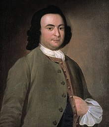 Ein junger, rundlicher George Mason mit einem braunen Anzug und einem weißen Halstuch auf einem Gemälde.