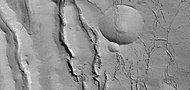 Close view of cracks of various sizes, as seen by HiRISE under HiWish program. Ice disappears along crack surfaces and makes crack larger.