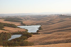 Les monts du Crete senesi, riches en terre de sienne[y].