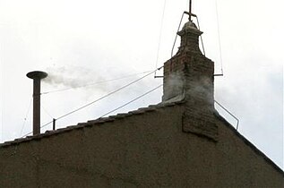 White smoke above the Sistine Chapel in 2005, signifying the election of Benedictus XVI