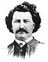 "Black and white bust shot of Louis Riel, after a carte de visite from 1884."