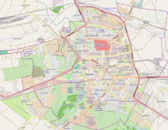 Mapa konturowa Zamościa, w centrum znajduje się punkt z opisem „Akademia Zamojska”