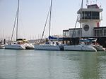 Catamarans docked at Les Minimes marina.