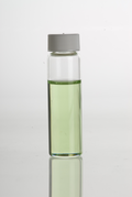 Lemon (Citrus limon) essential oil in a clear glass vial