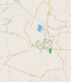 Mapa konturowa Skalbmierza, blisko centrum na prawo znajduje się punkt z opisem „Kościół św. Jana Chrzciciela w Skalbmierzu”