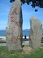 Sculpture with a poem on the beach