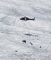 Transport of the equipment to the Morteratsch Glacier by a helicopter