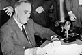 Roosevelt signing the Selective Service Act, 1940