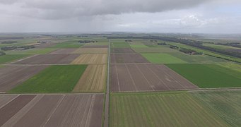 Photographie en couleurs et prise en hauteur de parcelles agricoles