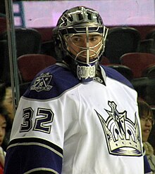 Photographie de Jonathan Quick dans la tenue des Kings de Los Angeles