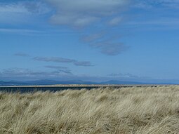 Rubh' na h-Innse Moire in the foreground with Innis Mhòr beyond and the hills of Sutherland in the background.