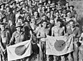 Image 54Australian soldiers display Japanese flags they captured at Kaiapit, New Guinea in 1943 (from History of the Australian Army)