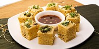 Dhokla, a steamed, fermented chana dal snack using lentils