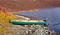 Square back canoe with a small outboard motor