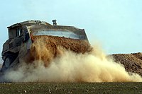 USMC CAT D9R erecting sand barrier