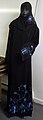 Abaya, a loose over-dress or caftan particularly associated with the Arabian peninsula.